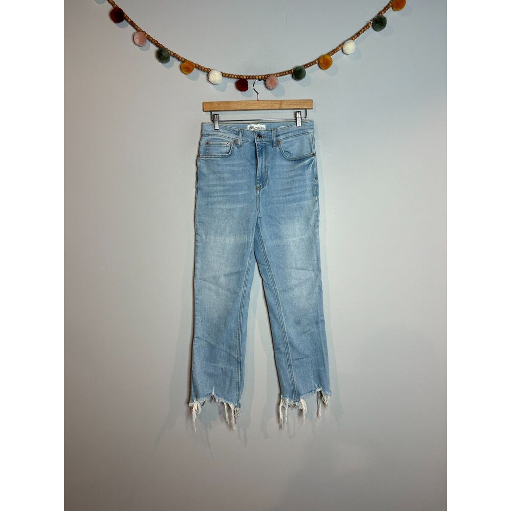 Zara The Dreed Flare raw hem light wash jeans